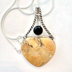 Beautiful, 2 inch, Maligano Jasper and Black Onyx pendant on a silver chain.
